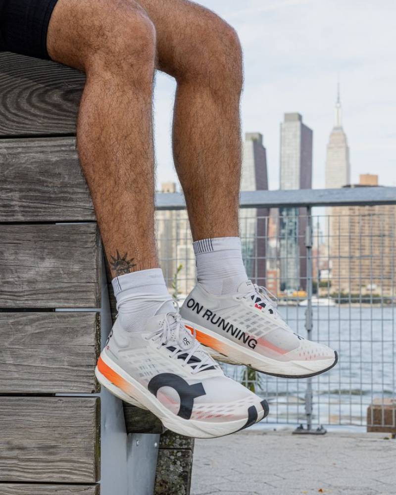On Cloudboom Strike White Orange