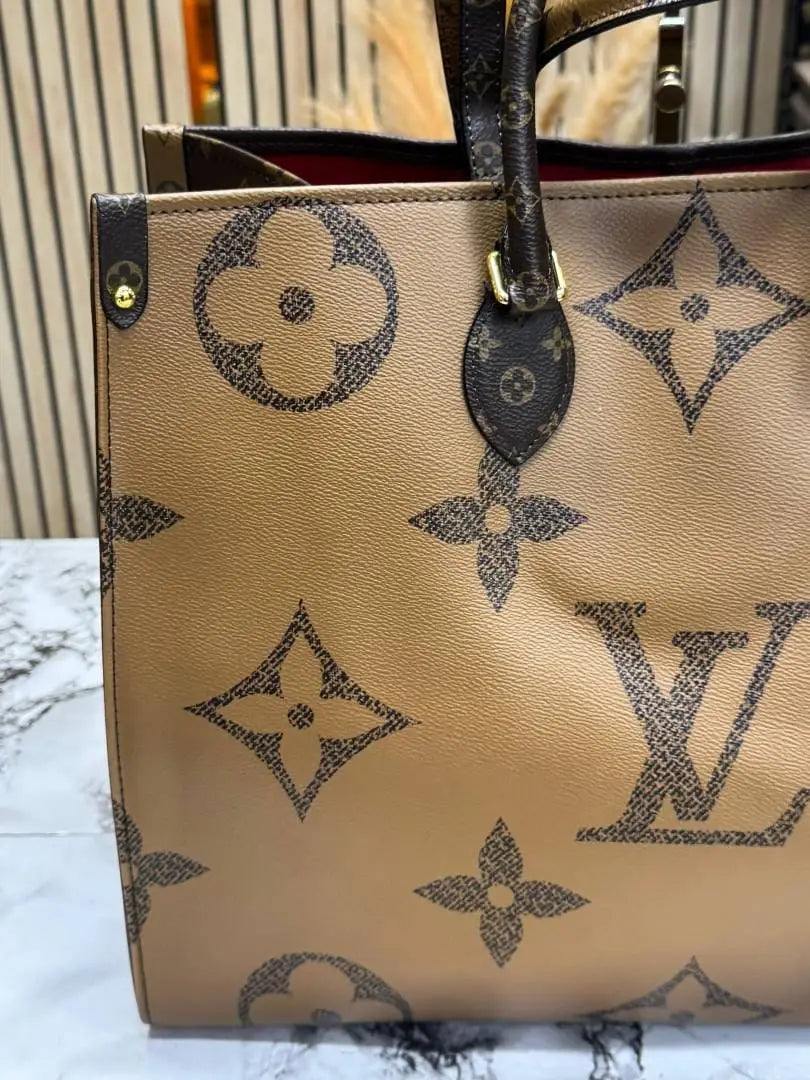 Louis vuitton premium onthego with dust bag brown